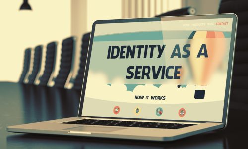 Identity As A Service on Landing Page of Mobile Computer Screen in Modern Meeting Room Closeup View. Toned. Blurred Image. 3D.